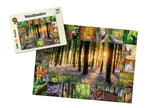 Waldbaden Puzzle mit 1000 Teilen von Starnberger Spiele. Das Bild zeigt die Puzzle-Schachtel sowie das fertig gelegte Puzzle mit einer stimmungsvollen Wald-Collage aus Bäumen, Waldblumen, Farnen, Pilzen und heimischen Tieren. Im Zentrum steht ein sonnendurchfluteter Waldweg, umrahmt von zahlreichen Naturmotiven.